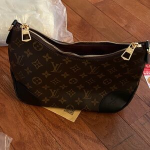 Brown and Black Monogram Bag. Comes with beauful gold purse chain and strap.